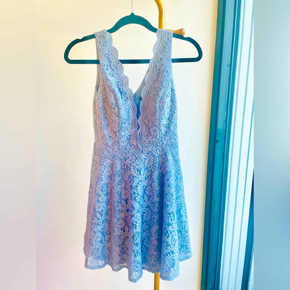light blue lace dress w/ sparkles. Size 3/medium. Like new, worn once.